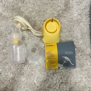 Medela Manual on portable Breast Pump new